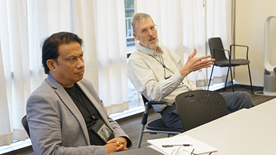 classroom discussion featuring instructor and participant