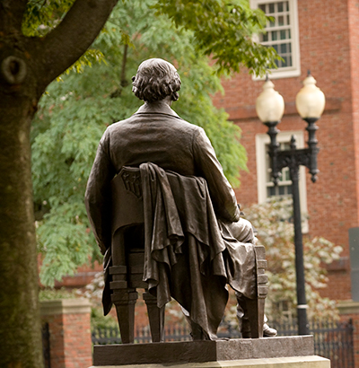 a statue in Harvard Square