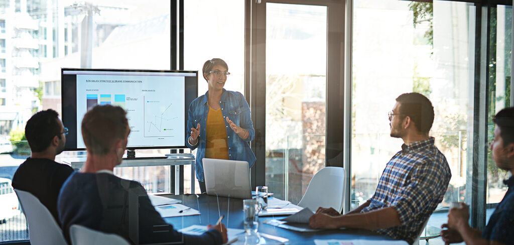 a confident presentation being given in a well-lit room