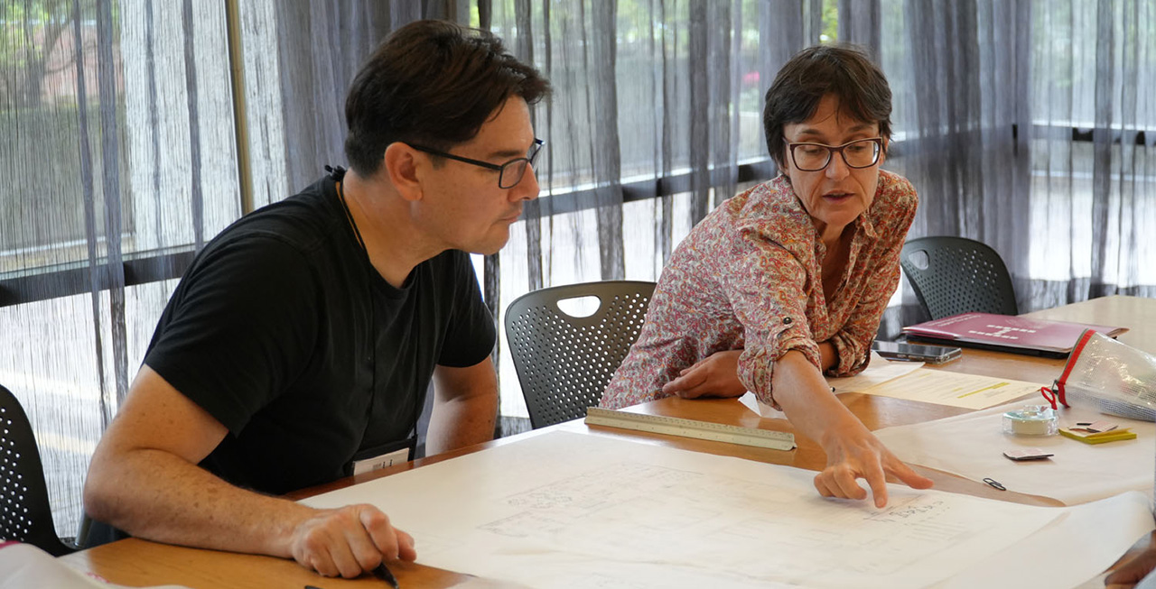 an image of professionals doing a design exercise in a light-filled room