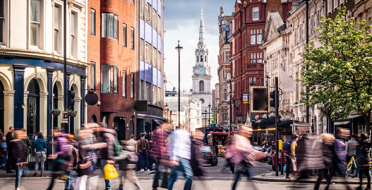 walking people in a busy city